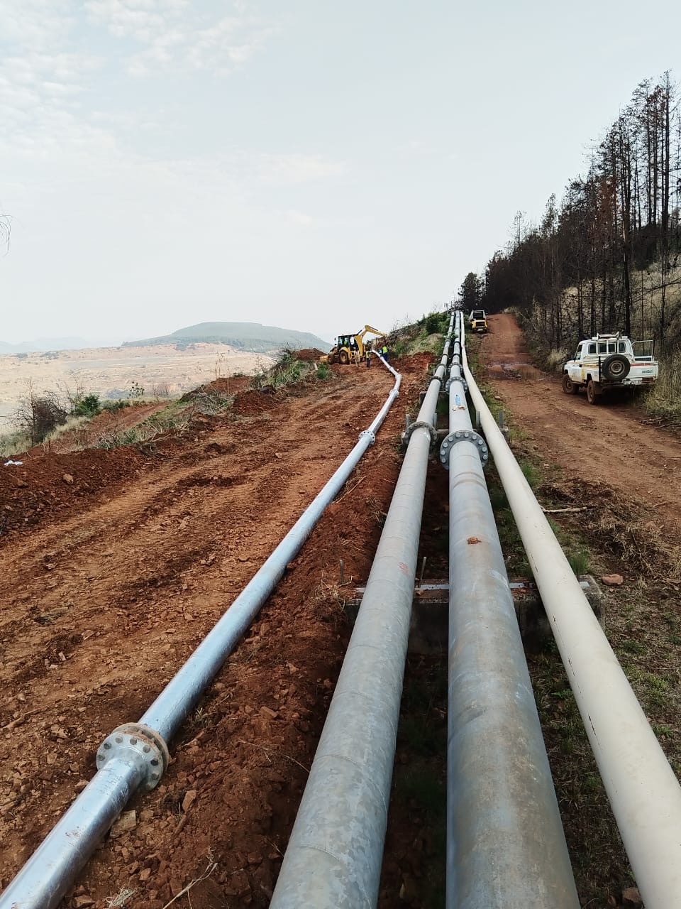 Multiple parallel slurry pipelines installed along an overland mining route
